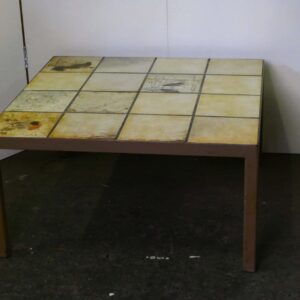 Steel base coffee table with tiled top