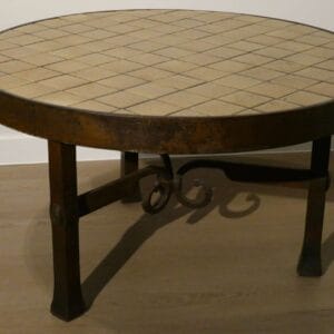 Coffee table on wrought iron base with tiled top