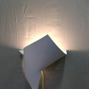 Wall lamp made of folded plastic